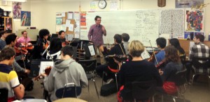 Matthew introducing the string ensemble to the sections of his piece