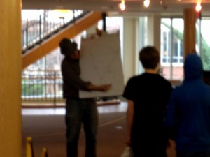 Unfortunately, a blurry shot of Mr. O'Brien (in his hat!) drawing the position of the triangles