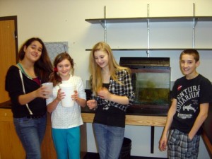 The "critter crew", readying the fish tank to be moved to the Commons